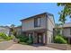 Attractive townhouse with tidy landscaping and a brick-paved drive offering a clean, appealing facade at 158 Maitland Ave, Altamonte Springs, FL 32701