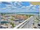 Panoramic views of the city and waterfront from the condo balcony, complete with outdoor seating at 2545 S Atlantic Ave # 2107-2108, Daytona Beach Shores, FL 32118