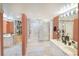 Large bathroom featuring two sinks and large enclosed shower/tub at 2545 S Atlantic Ave # 2107-2108, Daytona Beach Shores, FL 32118