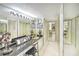 Elegant bathroom featuring a vanity area, stylish decor, and ample lighting at 2545 S Atlantic Ave # 2107-2108, Daytona Beach Shores, FL 32118