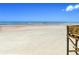Beautiful beach view with clear blue skies, ocean waves, and sandy shores at 2545 S Atlantic Ave # 2107-2108, Daytona Beach Shores, FL 32118