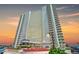 Stunning high-rise condo building featuring balconies and well maintained landscaping at 2545 S Atlantic Ave # 2107-2108, Daytona Beach Shores, FL 32118