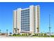 Stunning high-rise condo building showcasing a modern design with multiple balconies and ocean views at 2545 S Atlantic Ave # 2107-2108, Daytona Beach Shores, FL 32118