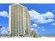 Luxury beachfront high-rise condo building with ocean views, private balconies, and manicured grounds at 2545 S Atlantic Ave # 2107-2108, Daytona Beach Shores, FL 32118