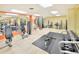 This gym features various weight training machines, weights, and a mirrored wall at 2545 S Atlantic Ave # 2107-2108, Daytona Beach Shores, FL 32118