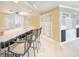 Bright kitchen features a breakfast bar with seating and ample counter space at 2545 S Atlantic Ave # 2107-2108, Daytona Beach Shores, FL 32118
