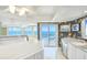 Well-equipped kitchen with stainless steel appliances and breathtaking ocean views at 2545 S Atlantic Ave # 2107-2108, Daytona Beach Shores, FL 32118