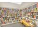 Community library with extensive collection of books and cozy reading space at 2545 S Atlantic Ave # 2107-2108, Daytona Beach Shores, FL 32118
