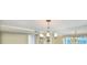 Living room with a fancy light fixture and ocean view at 2545 S Atlantic Ave # 2107-2108, Daytona Beach Shores, FL 32118
