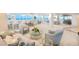 Bright and airy lobby lounge area with comfortable seating and stunning views of the ocean at 2545 S Atlantic Ave # 2107-2108, Daytona Beach Shores, FL 32118