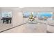 Elegant lobby area featuring modern decor, a grand piano, and seating areas with ocean views at 2545 S Atlantic Ave # 2107-2108, Daytona Beach Shores, FL 32118