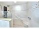 Modern walk-in shower featuring sleek fixtures, a built-in bench, and a contemporary glass enclosure at 2545 S Atlantic Ave # 2107-2108, Daytona Beach Shores, FL 32118