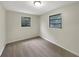 Well-lit bedroom with neutral decor and carpet flooring at 1111 28Th Nw St, Winter Haven, FL 33881