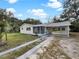 Charming single story home with covered carport and spacious yard at 1111 28Th Nw St, Winter Haven, FL 33881