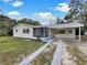 Updated single story home with a covered carport at 1111 28Th Nw St, Winter Haven, FL 33881