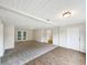 Bright and airy living room featuring new flooring and access to the backyard at 1111 28Th Nw St, Winter Haven, FL 33881