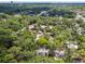 Aerial view showing community surrounded by lush trees at 213 Crown Oaks Way # 213, Longwood, FL 32779