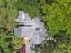 Overhead view of condo, highlighting its location within a tree-lined setting at 213 Crown Oaks Way # 213, Longwood, FL 32779