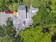 Overhead view of condo, highlighting its location within a tree-lined setting at 213 Crown Oaks Way # 213, Longwood, FL 32779