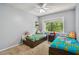 ' bedroom with two twin beds and window at 213 Crown Oaks Way # 213, Longwood, FL 32779