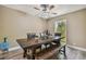 Farmhouse dining table with bench seating in dining room at 213 Crown Oaks Way # 213, Longwood, FL 32779