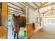 Individual horse stall with wood construction and shavings at 213 Crown Oaks Way # 213, Longwood, FL 32779