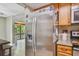 Stainless steel refrigerator in modern kitchen at 213 Crown Oaks Way # 213, Longwood, FL 32779