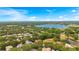 Expansive aerial view of the lake and neighborhood at 2107 Westover Reserve Blvd, Windermere, FL 34786