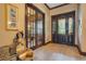 Bright entryway with hardwood floors and French doors at 2107 Westover Reserve Blvd, Windermere, FL 34786