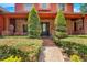 Brick front porch with double doors and manicured landscaping at 2107 Westover Reserve Blvd, Windermere, FL 34786