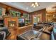 Cozy living room with fireplace, built-ins, and hardwood floors at 2107 Westover Reserve Blvd, Windermere, FL 34786