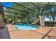 Inviting screened pool with a slide, perfect for relaxation and fun at 2107 Westover Reserve Blvd, Windermere, FL 34786