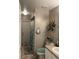 Small bathroom with shower, toilet and vanity at 517 Cardinal Dr, Kissimmee, FL 34759