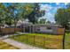 Charming single-story home with a well-maintained front yard and covered parking at 618 S Lakeland Ave, Orlando, FL 32805