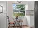 Cozy eat-in kitchen nook with a window view and modern white cabinetry at 618 S Lakeland Ave, Orlando, FL 32805