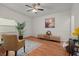 Cozy living room with neutral walls, a ceiling fan, and comfortable furnishings at 618 S Lakeland Ave, Orlando, FL 32805