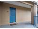 Apartment front door with the unit number 1035 and a neutral-colored exterior at 7250 Westpointe Blvd # 1035, Orlando, FL 32835
