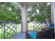 Patio featuring comfortable seating and a view of lush greenery and the community, creating a relaxing outdoor space at 7250 Westpointe Blvd # 1035, Orlando, FL 32835