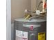 Modern Rheem Performance water heater with visible connections and energy guide label at 7250 Westpointe Blvd # 1035, Orlando, FL 32835