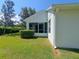 Screened porch and fenced backyard with lush landscaping at 3844 Eversholt St, Clermont, FL 34711