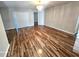 Living room features hardwood floors and a chandelier at 3844 Eversholt St, Clermont, FL 34711