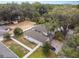 Aerial view of a two-story house with a backyard and white fence at 222 Emmy Cv, Oviedo, FL 32765