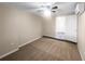 Comfortable bedroom with neutral walls and carpet, equipped with a ceiling fan at 122 Club Rd, Sanford, FL 32771