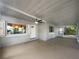 Covered patio offering an ideal space for relaxation with views of the surrounding landscape at 122 Club Rd, Sanford, FL 32771
