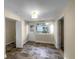 Bright room with neutral walls, tile floor, access to the outside, and two interior door options at 122 Club Rd, Sanford, FL 32771