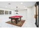 Basement with pool table, hardwood flooring and bright lighting at 1860 Via Contessa, Winter Park, FL 32789