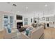 Living room with fireplace and access to the pool at 1860 Via Contessa, Winter Park, FL 32789