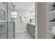 Bathroom with modern vanity, glass shower enclosure, and elegant finishes at 840 Kenilworth Ter, Orlando, FL 32803