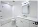 Bright bathroom with a modern vanity, quartz countertops, and a shower-tub combo with subway tile at 3480 Fairway Ln, Orlando, FL 32804