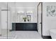 Sleek bathroom design with dual vanities, modern fixtures, marble flooring, and glass-enclosed shower at 3480 Fairway Ln, Orlando, FL 32804
